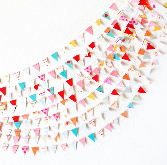 Stylish triangle paper garland for parties.
