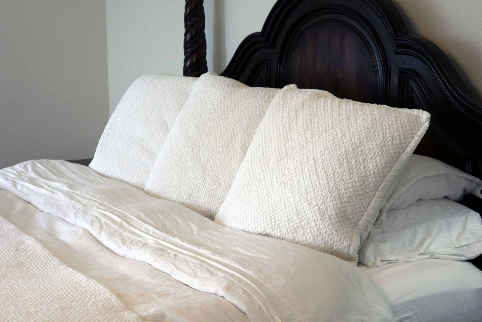 white linen bed